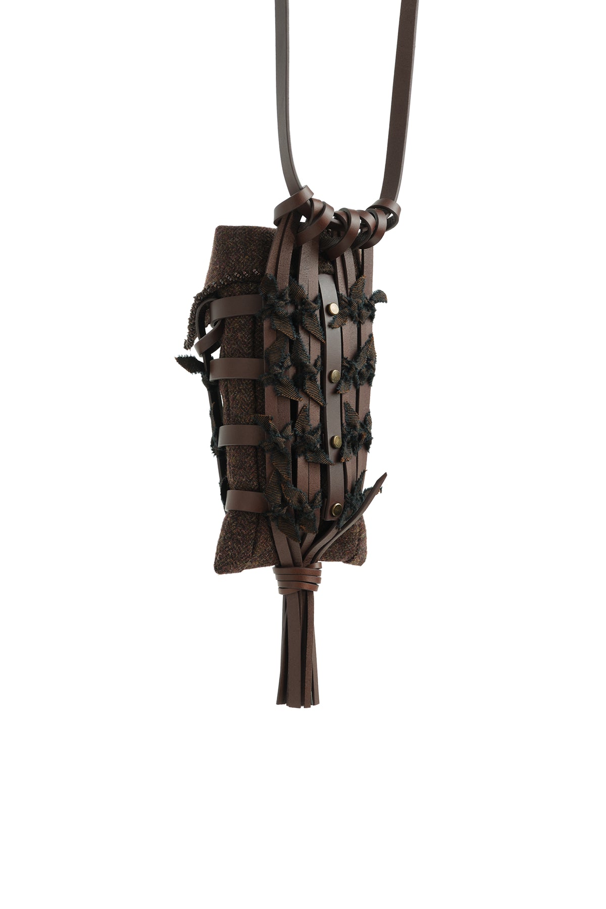 Epijé Seed Bag in Brown with a tassel detail and a matching leather strap, shown against a plain white background.